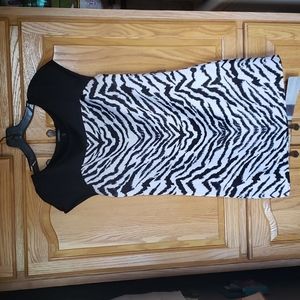 Like new zebra stripe dress. Wear with or without belt